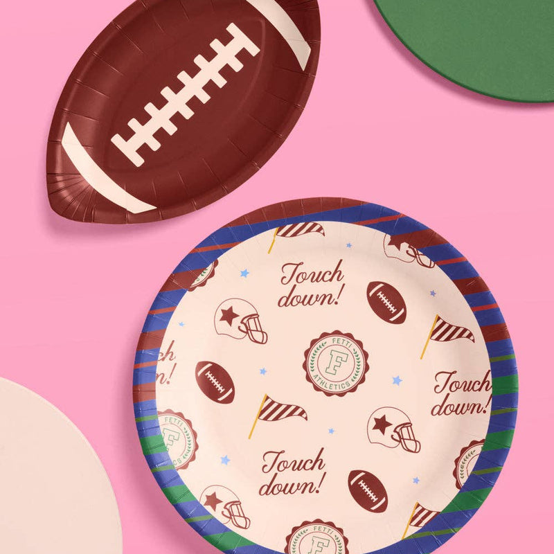 Varsity football party plates set with round and football-shaped paper plates