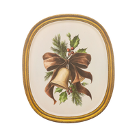 Rounded cream bamboo tray with a gold-framed vintage bell-and-bow illustration.