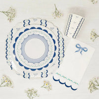 Overhead flat lay of blue ribbon tableware
