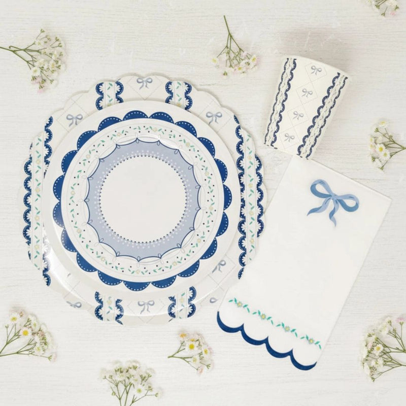 Overhead flat lay of blue ribbon tableware