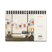 Halloween-themed product packaging with decorative items on a white background, back view.