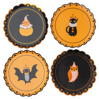Four vintage Halloween character plates with black grounds and orange scalloped rims, featuring a candy corn, a black cat, a bat, and a ghost.