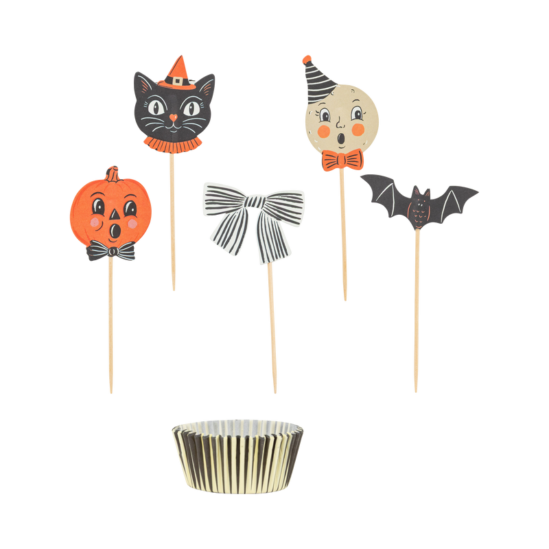 Halloween-themed cupcake toppers with a black and gold cupcake liner.