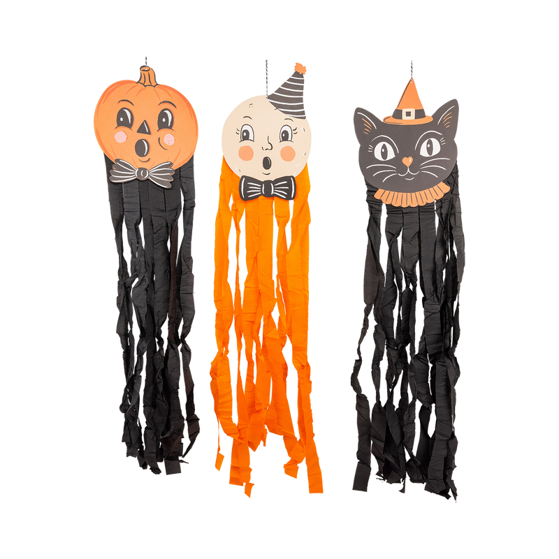 Three Halloween-themed decorations: a pumpkin, ghost, and cat with crepe paper streamers, hanging.