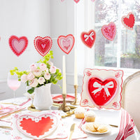 Vintage Heart Shaped Plate Set styled on a Valentine’s Day table with candles and florals