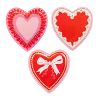 Vintage heart shaped paper plates in red, pink, and cream Valentine designs