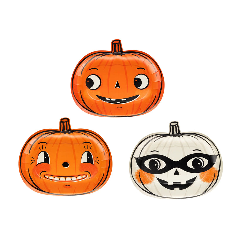 The three designs included in the Vintage Pumpkin Plate Set—two orange pumpkins and one white masked pumpkin; 3 of each, 9 total.