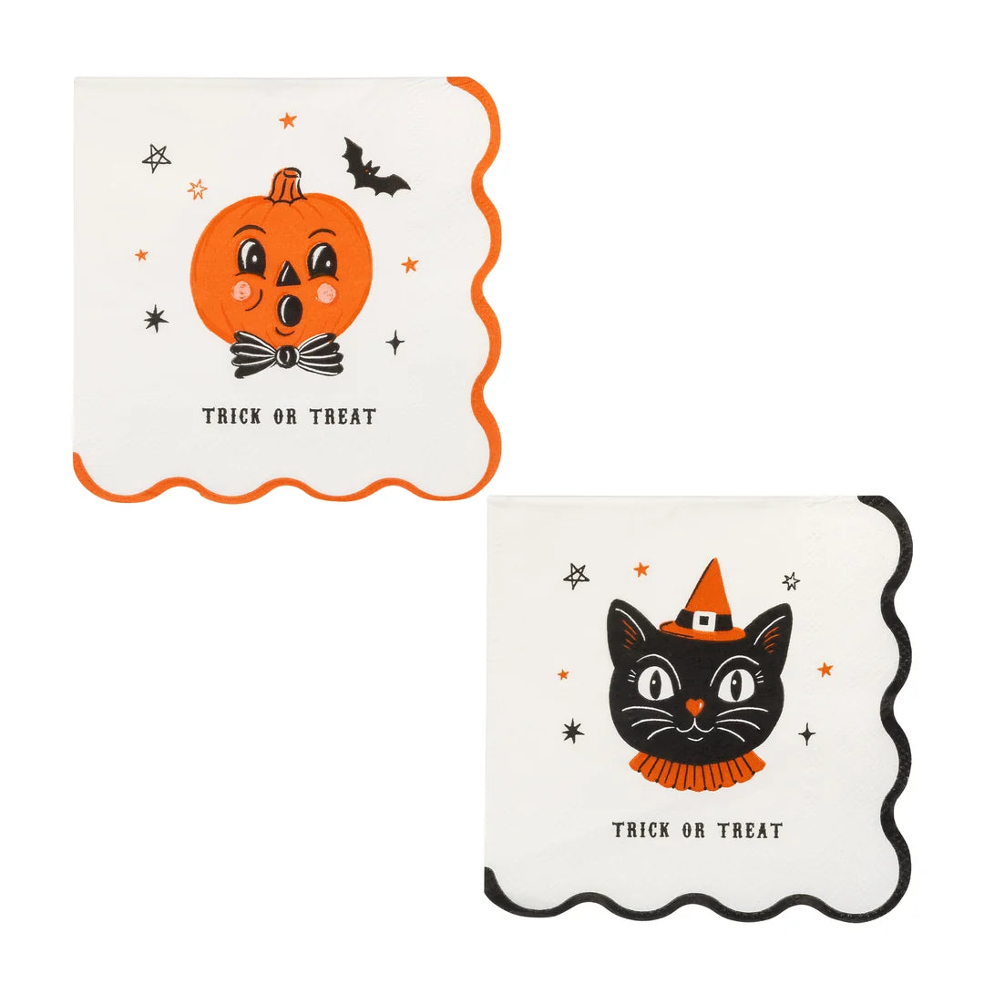 Two vintage style Trick or Treat paper napkins with scalloped edges, one with a smiling jack o’lantern in a bow tie and orange border, one with a black cat in a witch hat and black border