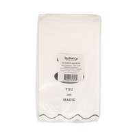 Pack of paper napkins with the brand on a clear packaging, back view.