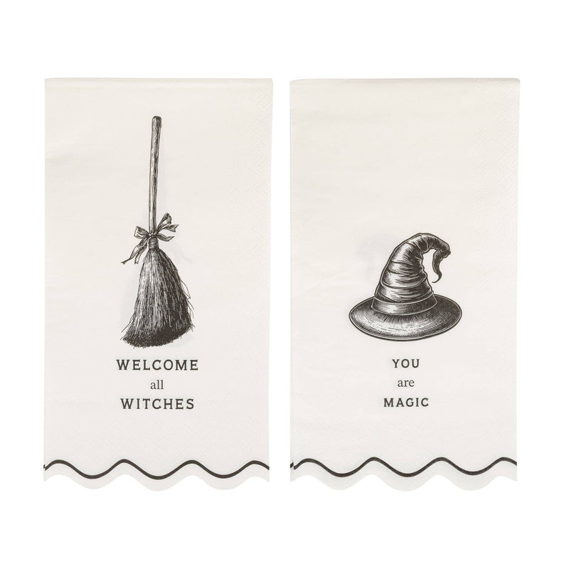 Cream dinner napkin with bold black "WELCOME ALL WITCHES" & "YOU are MAGIC" text and a wavy edge, front view.