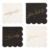 Set of four black and cream graduation napkins with gold foil messages including Congrats, Hooray, Graduate, and You Did It