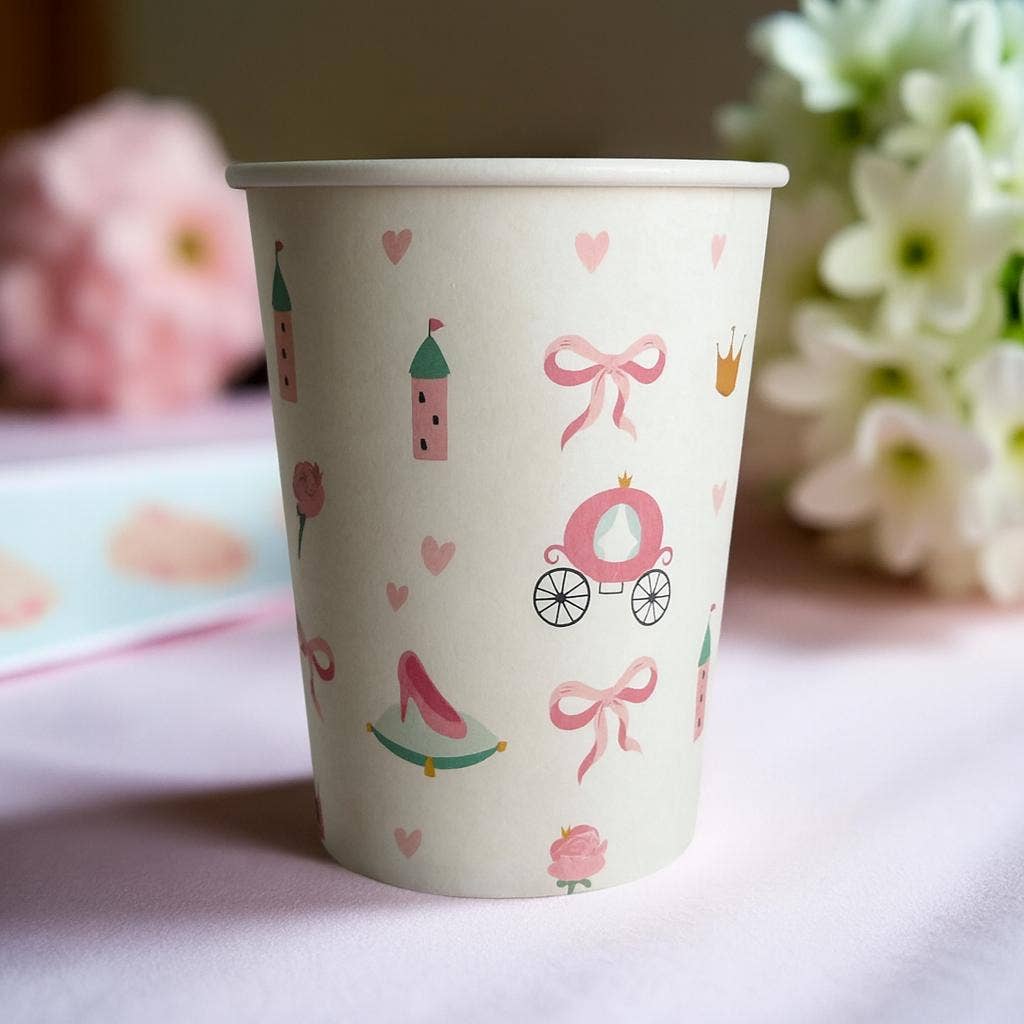Close-up of a princess cup showing glass slipper and magic wand art