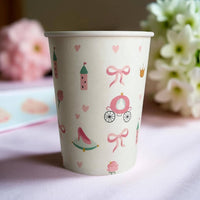 Close-up of a princess cup showing glass slipper and magic wand art
