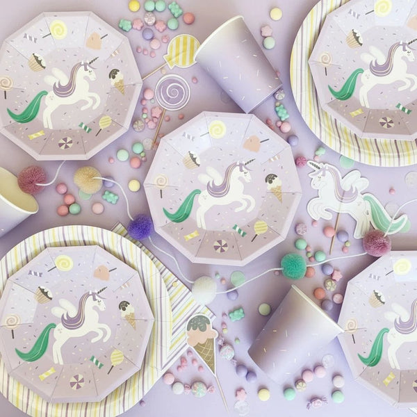 Flat lay of the full Sweet Unicorn collection including cups and octagonal plates