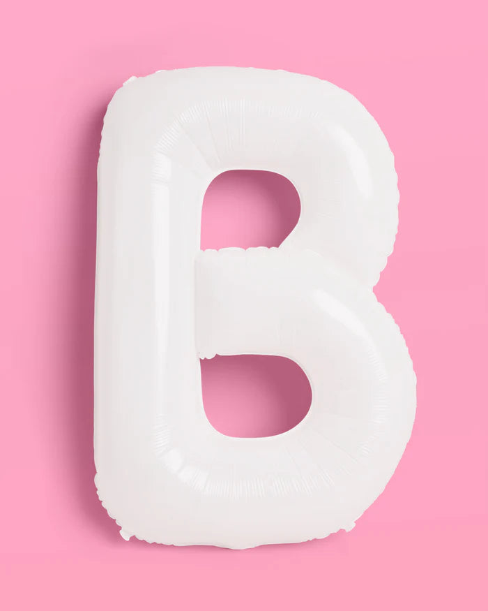 Single white matte mylar letter B balloon on pink background showing 40 inch scale and matte finish