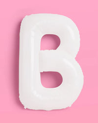 Single white matte mylar letter B balloon on pink background showing 40 inch scale and matte finish