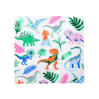Wild Dinosaur paper napkin with colorful dinos, tropical leaves, and a smoking volcano on white