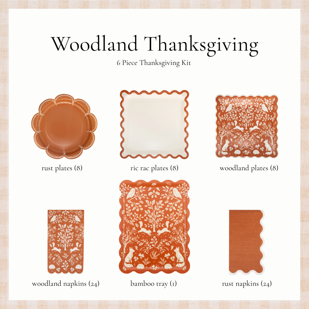Woodland Thanksgiving party kit with rust plates, ric rac plates, woodland plates, woodland napkins, a bamboo tray, and rust napkins