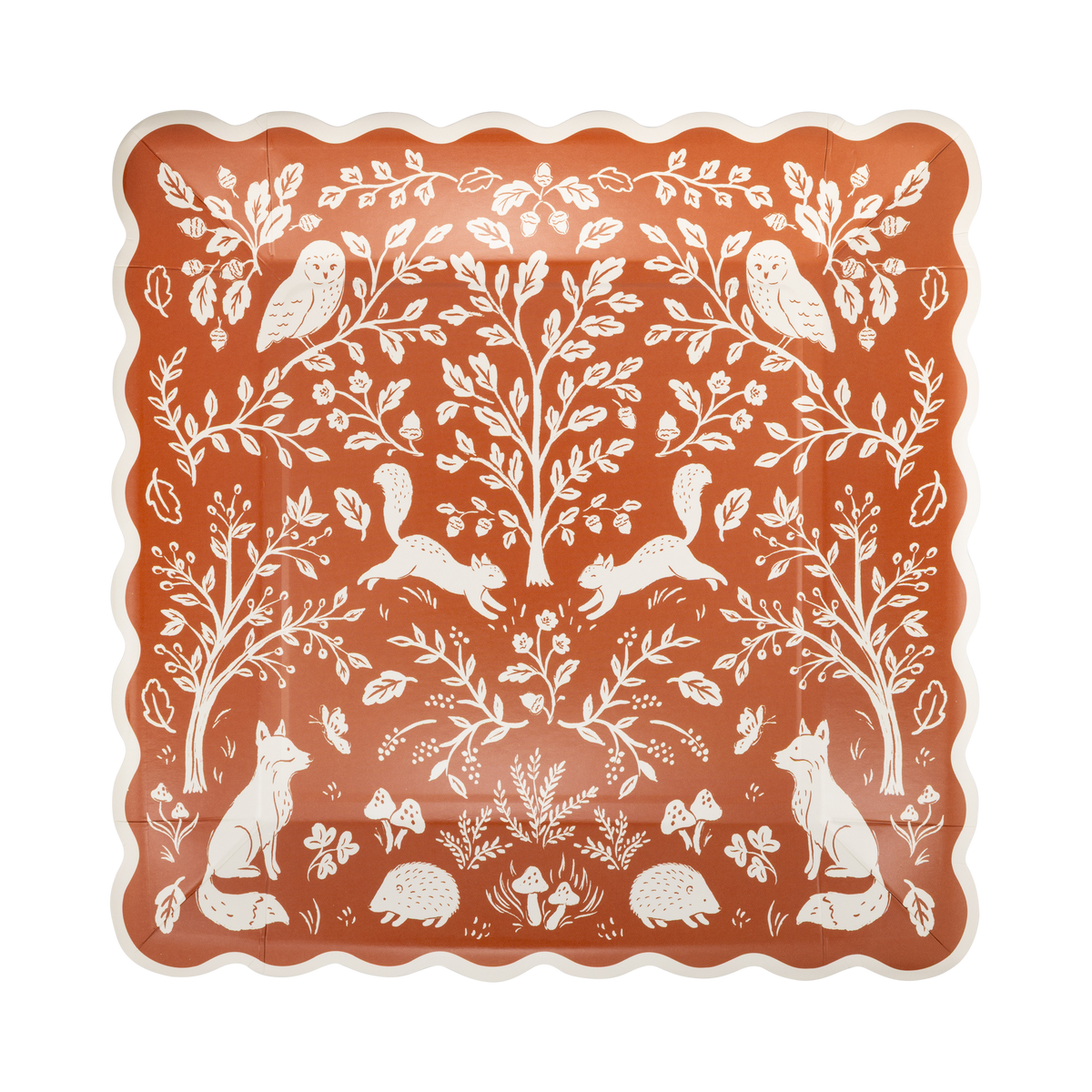 Rust square paper plates with a white woodland print of foxes, owls, squirrels, and hedgehogs, set of 8
