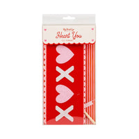 Packaged XOXO felt pennant with wooden dowel and ribbon