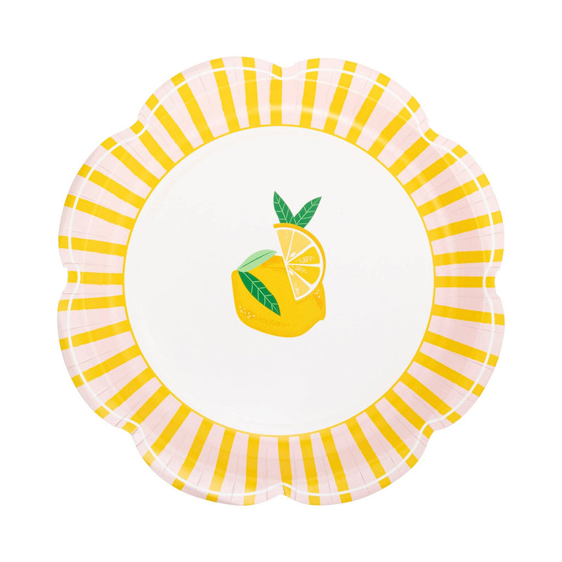 Yellow and pink striped scalloped plate with lemon illustration center